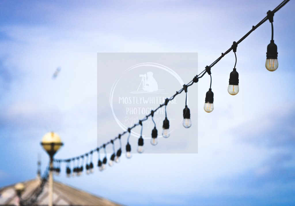 string of electrical lights LLandudno pier abstract