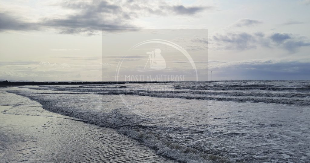 sea shore prestatyn barkby beach silver light ocean waves ripples